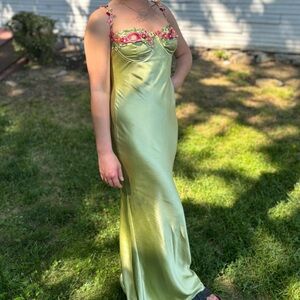 Elegant Green Satin Dress with Floral Details